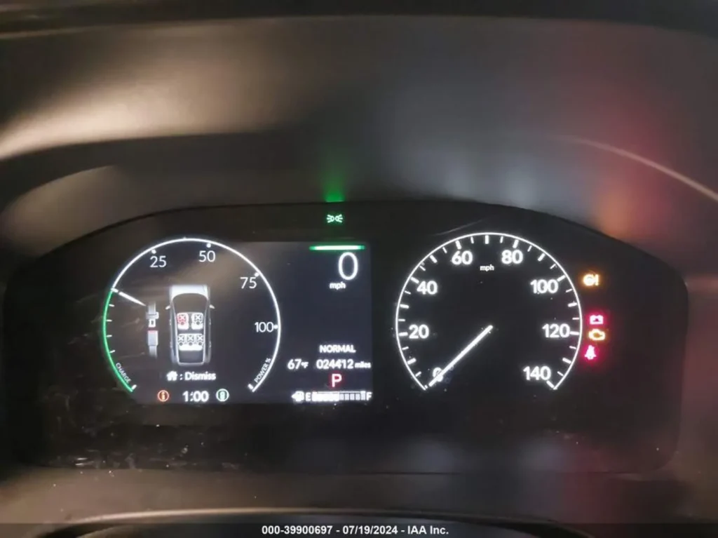 Zestaw wskaźników Honda CR-V; przebieg 24 412 mil, kontrolki aktywne.